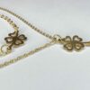 Ketting en armband met (open)klaver